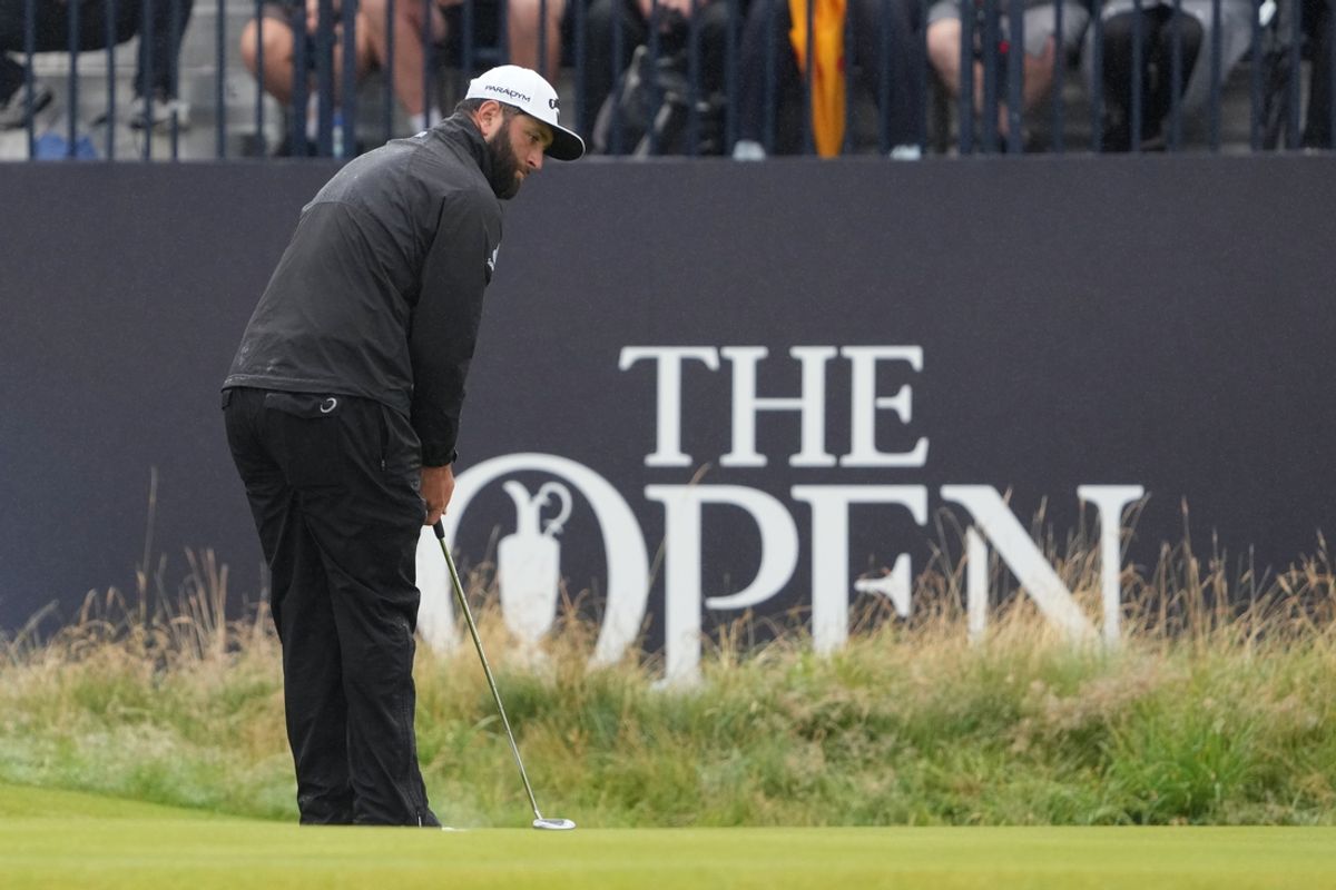 Jul 23, 2023; Hoylake, England, GBR; Jon Rahm putts on the third green during the final round of The Open Championship golf tournament. Mandatory Credit: Kyle Terada-Imagn Images