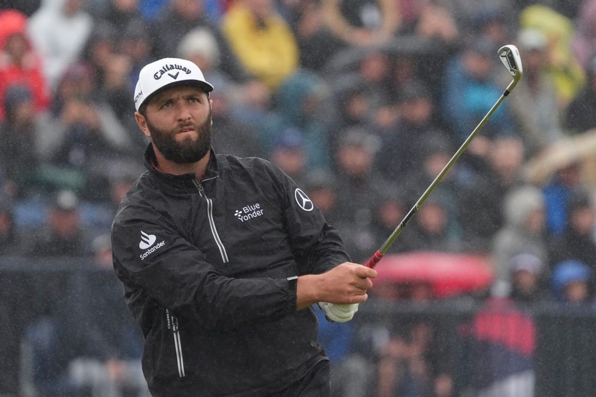 Jul 23, 2023; Hoylake, England, GBR; Jon Rahm plays his shot from the fourth tee during the final round of The Open Championship golf tournament. Mandatory Credit: Kyle Terada-Imagn Images