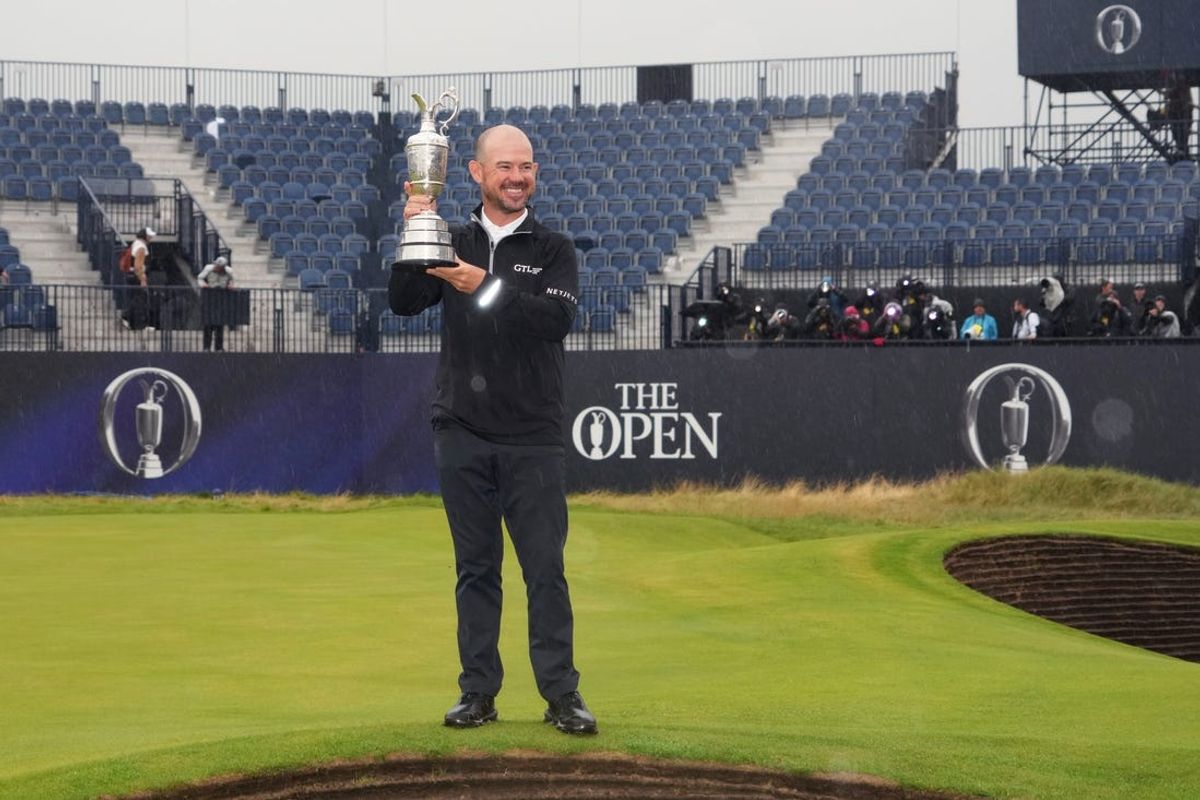 Jul 23, 2023; Hoylake, England, GBR; Brian Harman poses with the Claret Jug after winning The Open Championship golf tournament. Mandatory Credit: Kyle Terada-USA TODAY Sports