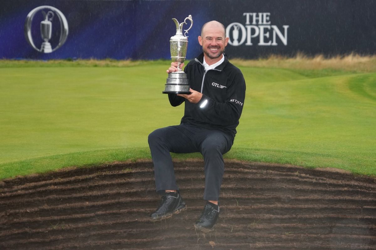 Jul 23, 2023; Hoylake, England, GBR; Brian Harman poses with the Claret Jug after winning The Open Championship golf tournament. Mandatory Credit: Kyle Terada-USA TODAY Sports