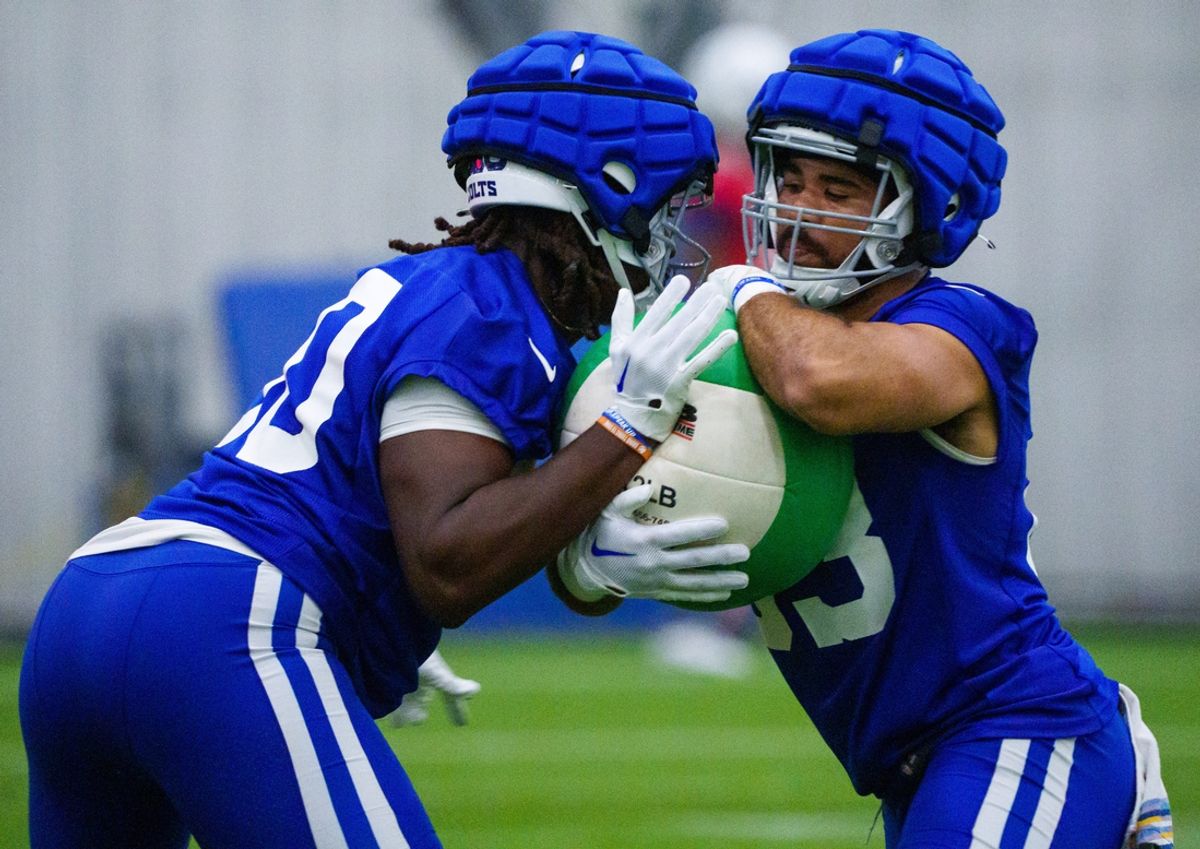 Indianapolis Colts tight ends Jelani Woods (80) and Kylen Granson (83) work through drills Friday, July 28, 2023, during an indoor practice at Grand Park Sports Campus in Westfield, Indiana.