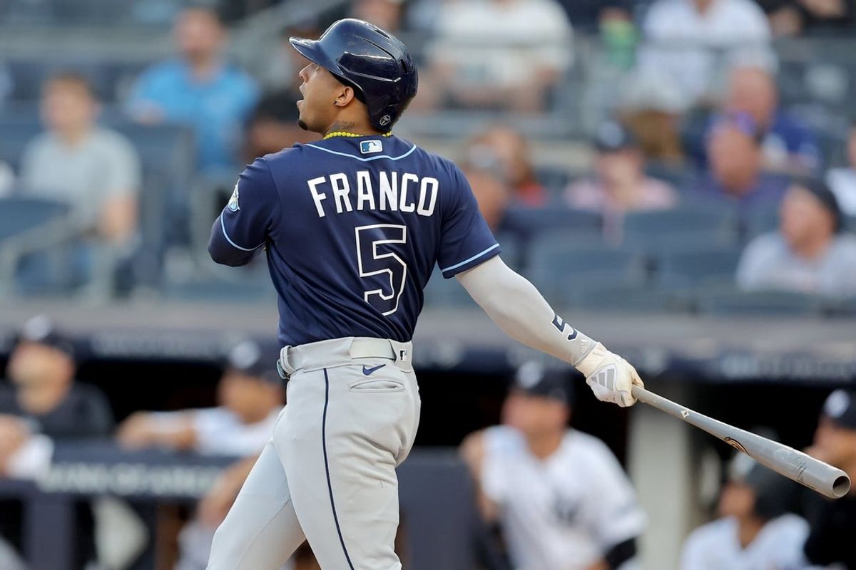 Aug 2, 2023; Bronx, New York, USA; Tampa Bay Rays shortstop Wander Franco (5) follows through on a two run home run against the New York Yankees during the first inning at Yankee Stadium. Mandatory Credit: Brad Penner-Imagn Images
