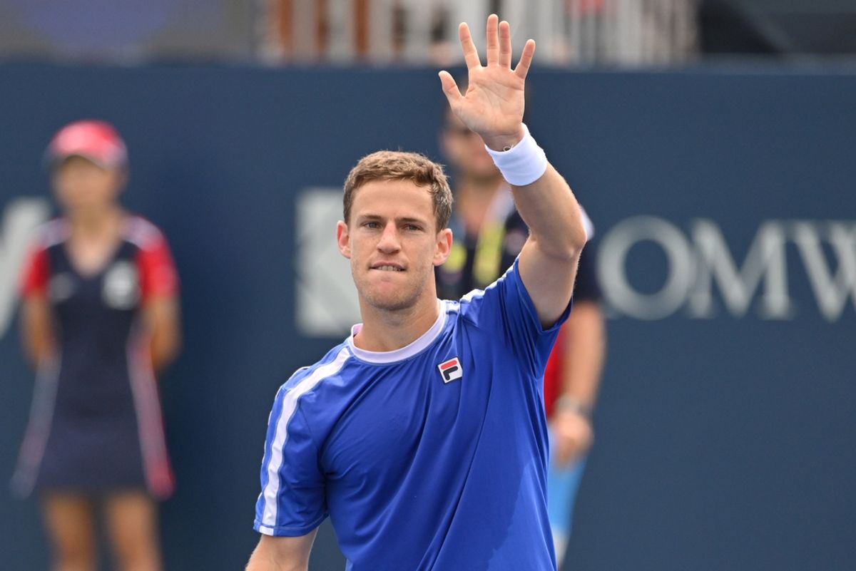 Aug 6, 2023; Toronto, Ontario, Canada;  Diego Schwartzman (ARG) waves to fans after defeating Aleksandar Vukic (AUS) (not shown) during qualifying play at Sobeys Stadium. Mandatory Credit: Dan Hamilton-Imagn Images