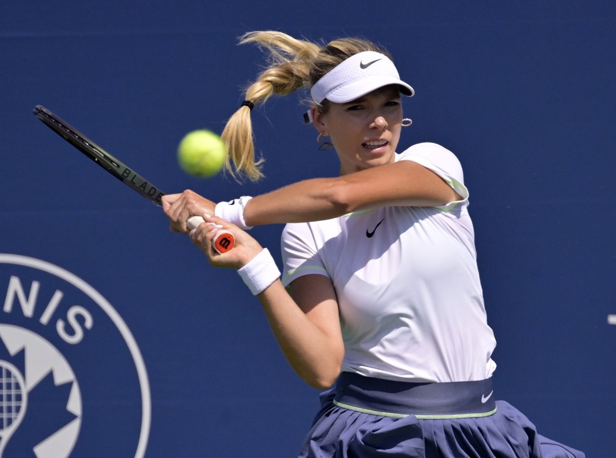 Aug 9, 2023; Montreal, Quebec, Canada; Kimberly Birrell (AUS) hits a backhand against Coco Gauff (USA) during a second round match at IGA Stadium. Mandatory Credit: Eric Bolte-Imagn Images