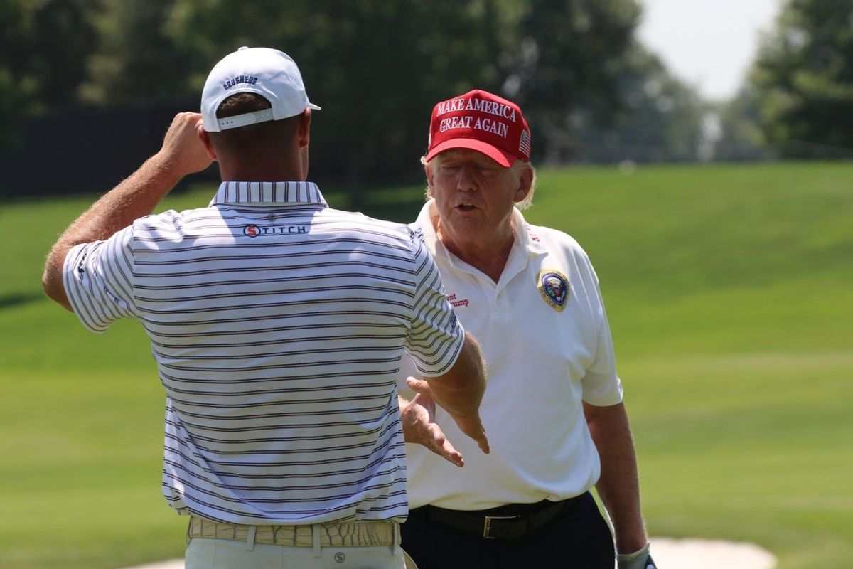 Bedminster, NJ August 9, 2023 -- LIV player Bryson DeChambeau with former President Donald Trump on the driving range as he played at Trump National in Bedminster before the weekend   s LIV Golf Tournament.