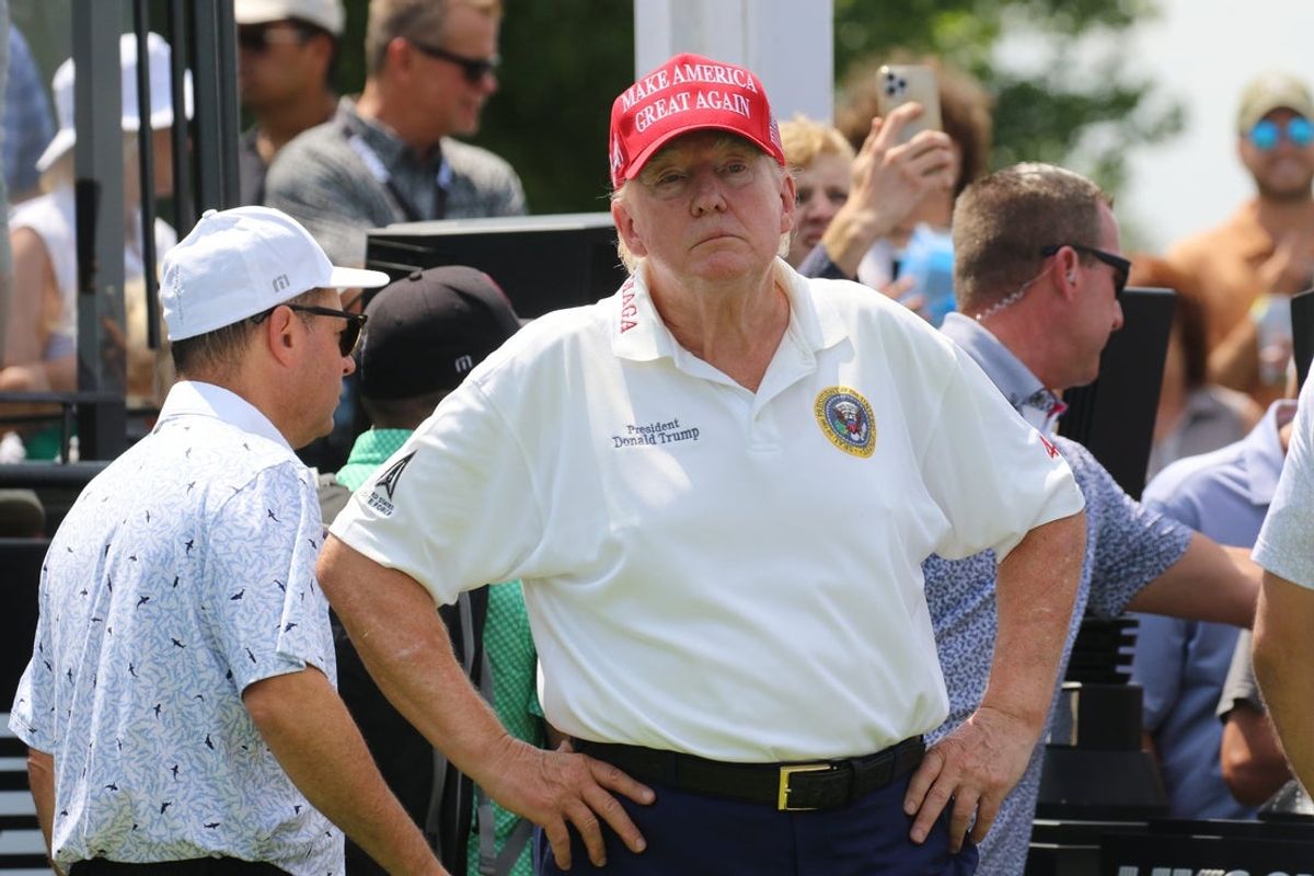 Bedminster, NJ August 11, 2023 -- Former President Donald Trump at the first tee before the opening round of the 2023 LIV Golf Tournament at Trump National in Bedminster, NJ on August 11, 2023.