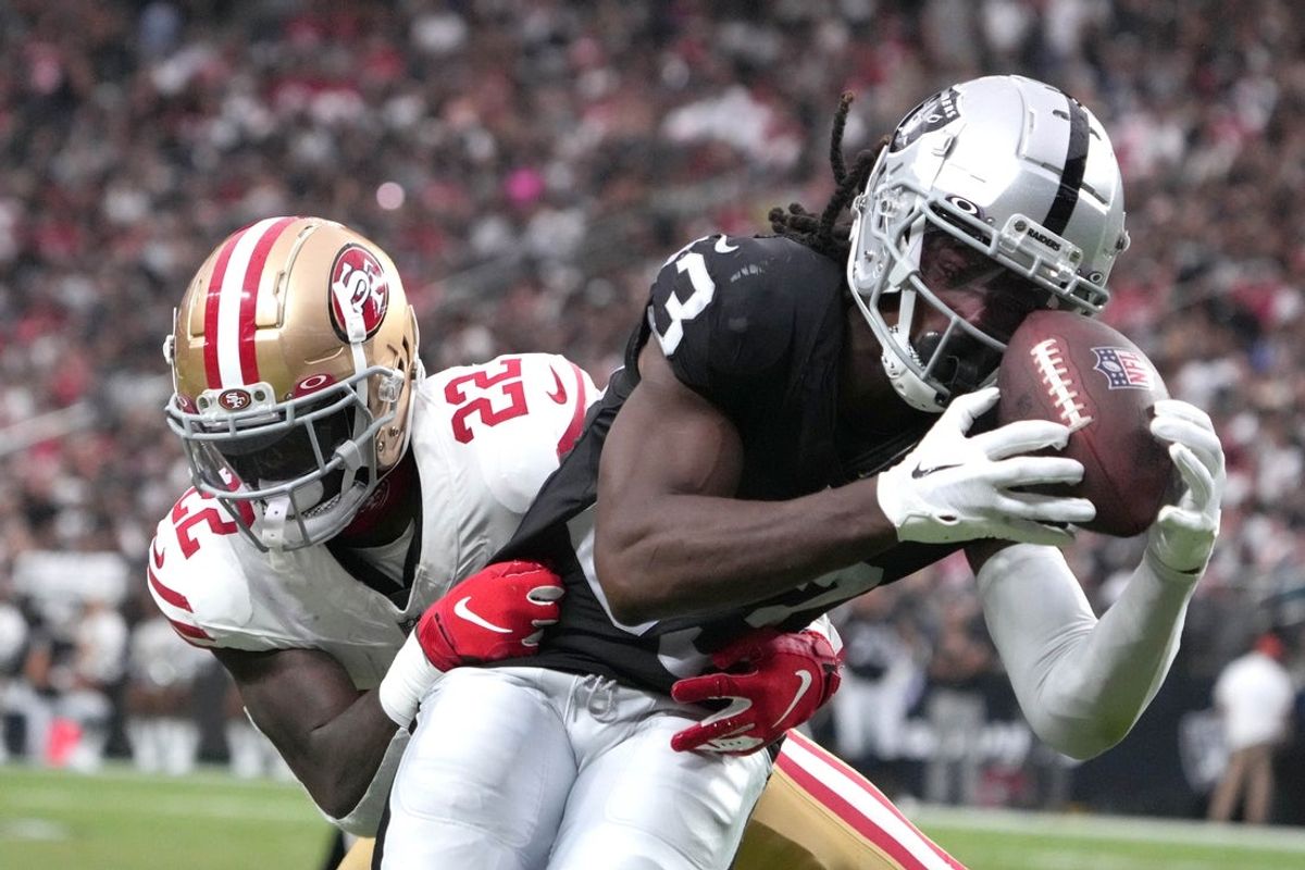 Aug 13, 2023; Paradise, Nevada, USA; Las Vegas Raiders wide receiver Kristian Wilkerson (83) catches the ball against San Francisco 49ers cornerback D'Shawn Jamison (22) in the second half at Allegiant Stadium. Mandatory Credit: Kirby Lee-Imagn Images