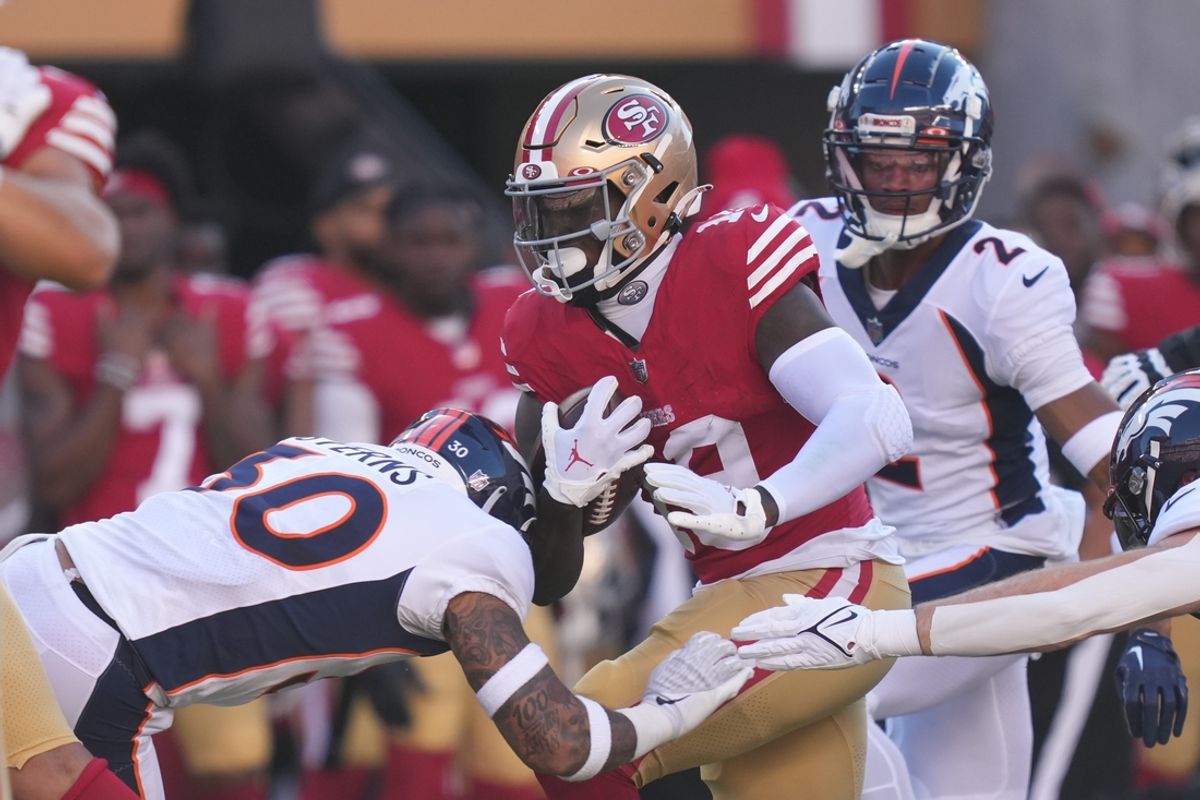 August 19, 2023; Santa Clara, California, USA; San Francisco 49ers wide receiver Deebo Samuel (19) is tackled by Denver Broncos safety Caden Sterns (30) during the first quarter at Levi's Stadium. Mandatory Credit: Kyle Terada-USA TODAY Sports