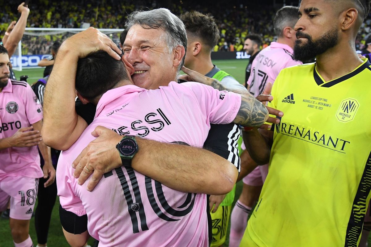Aug 19, 2023; Nashville, TN, USA; Inter Miami forward Lionel Messi (10) reacts with head coach Tata Martino after winning the Leagues Cup Championship match against Nashville SC at GEODIS Park. Mandatory Credit: Christopher Hanewinckel-Imagn Images