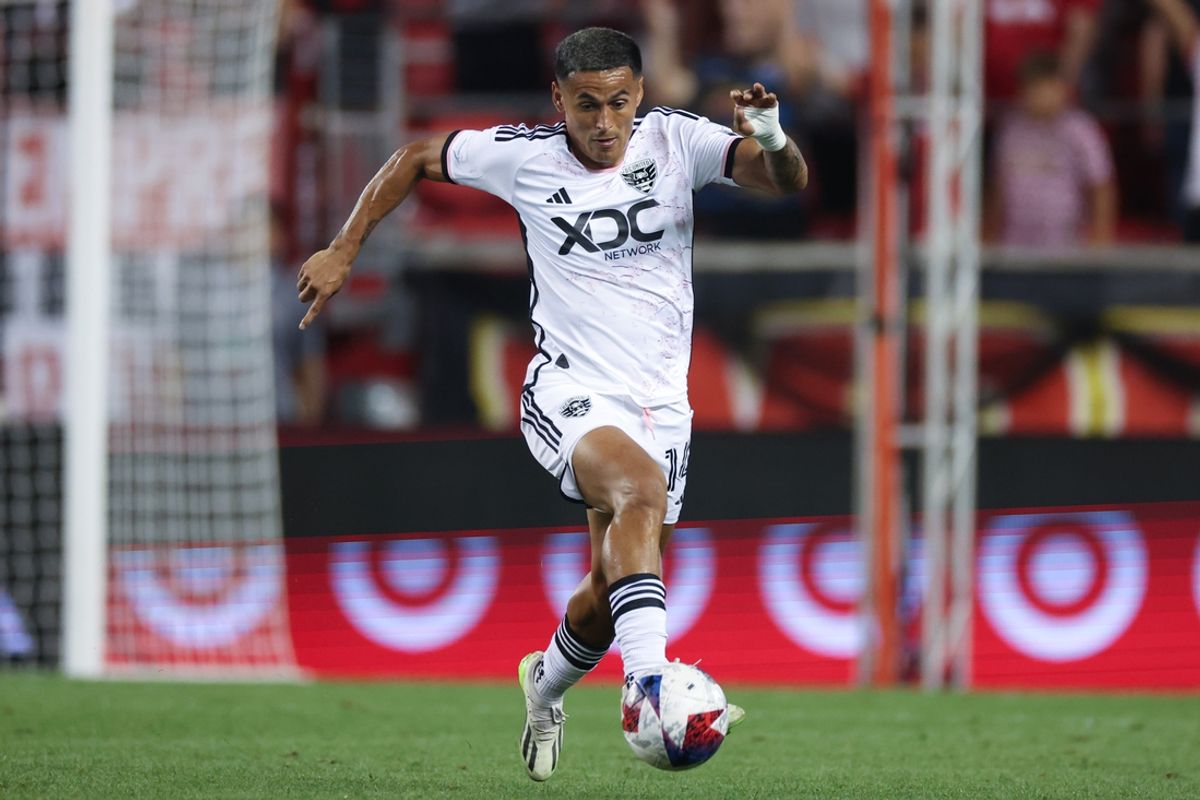 Aug 20, 2023; Harrison, New Jersey, USA; D.C. United midfielder Andy Najar (14) controls the ball against the New York Red Bulls during the second half at Red Bull Arena. Mandatory Credit: Vincent Carchietta-Imagn Images