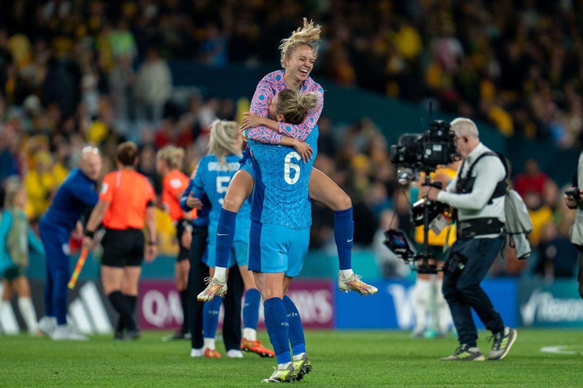 Aug 16, 2023; Sydney, AUSTRALIA;  Esme Morgan (15 England) jumps on Millie Bright (6 England) after the FIFA Womens World Cup 2023 semifinal football match between Australia and England at Stadium Australia in Sydney, Australia.   Mandatory Credit: Sipa USA via USA TODAY Sports