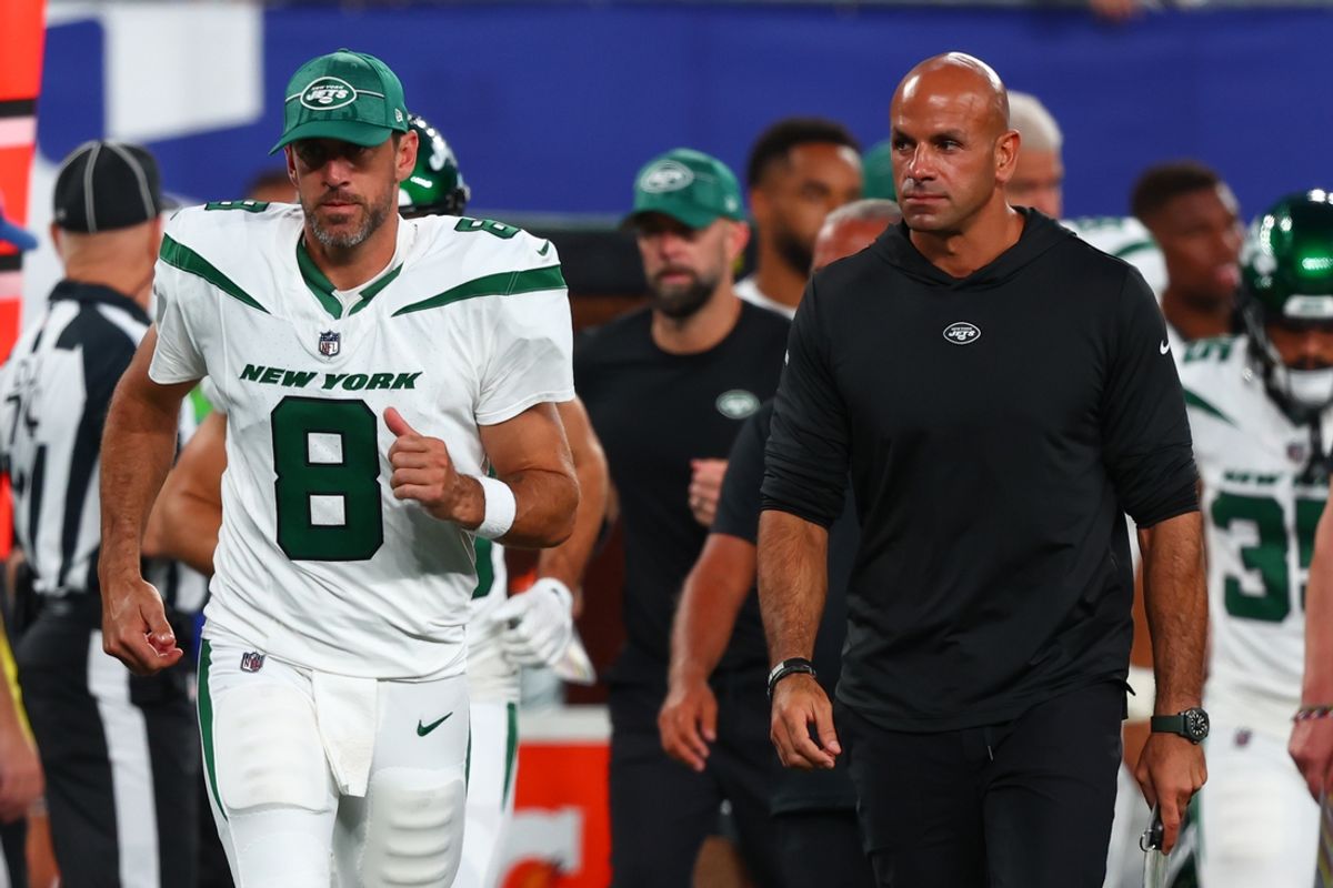 Aug 26, 2023; East Rutherford, New Jersey, USA; New York Jets quarterback Aaron Rodgers (8) and head coach Robert Saleh leave the field after the first half of their game against the New York Giants at MetLife Stadium. Mandatory Credit: Ed Mulholland-Imagn Images