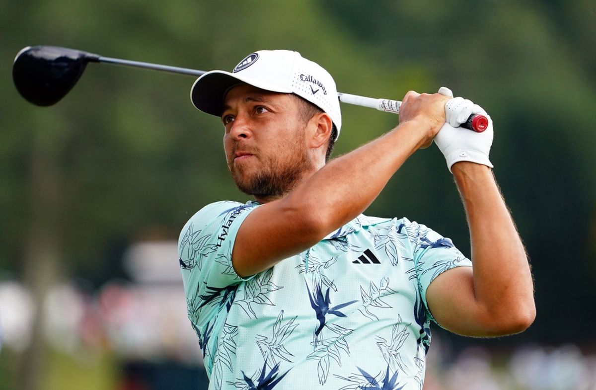 Aug 27, 2023; Atlanta, Georgia, USA; Xander Schauffele plays his shot from the sixth tee during the final round of the TOUR Championship golf tournament at East Lake Golf Club. Mandatory Credit: John David Mercer-Imagn Images