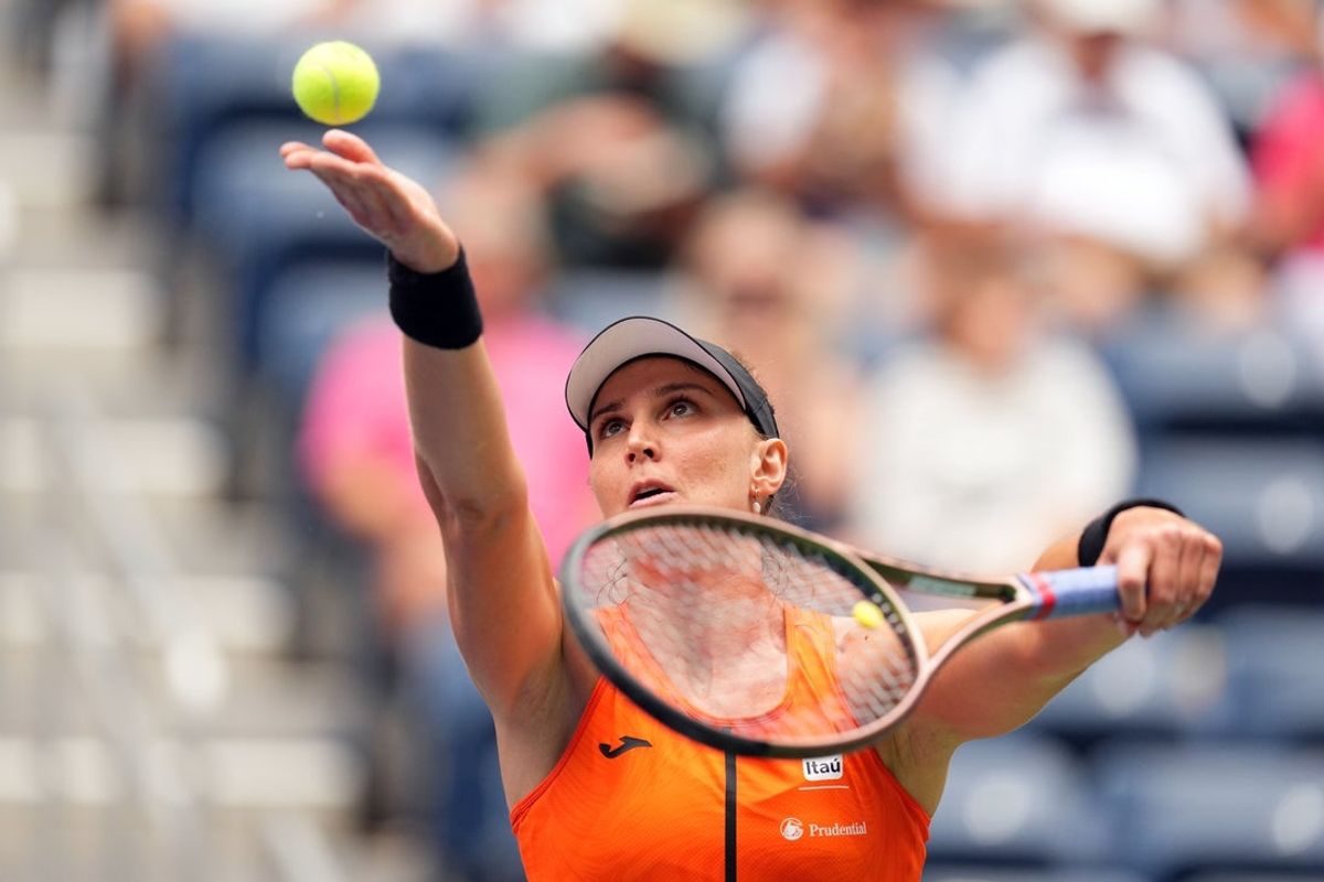 Aug 28, 2023; Flushing, NY, USA; Beatriz Haddad Maia of Brazil serves to Sloane Stephens of the United States on day one of the 2023 U.S. Open at the Billie Jean King National Tennis Center. Mandatory Credit: Danielle Parhizkaran-Imagn Images