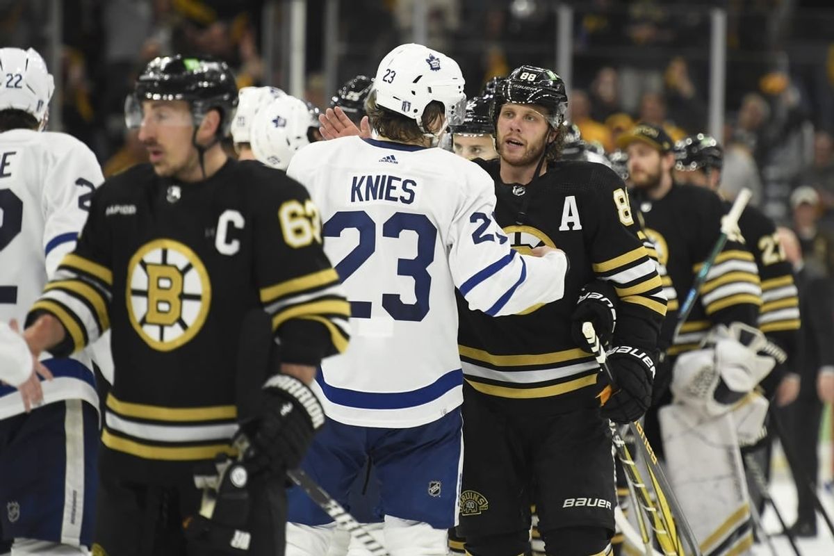 May 4, 2024; Boston, Massachusetts, USA; Toronto Maple Leafs left wing Matthew Knies (23) and Boston Bruins right wing David Pastrnak (88) speak after the Bruins defeated the Leafs in overtime in game seven of the first round of the 2024 Stanley Cup Playoffs at TD Garden.