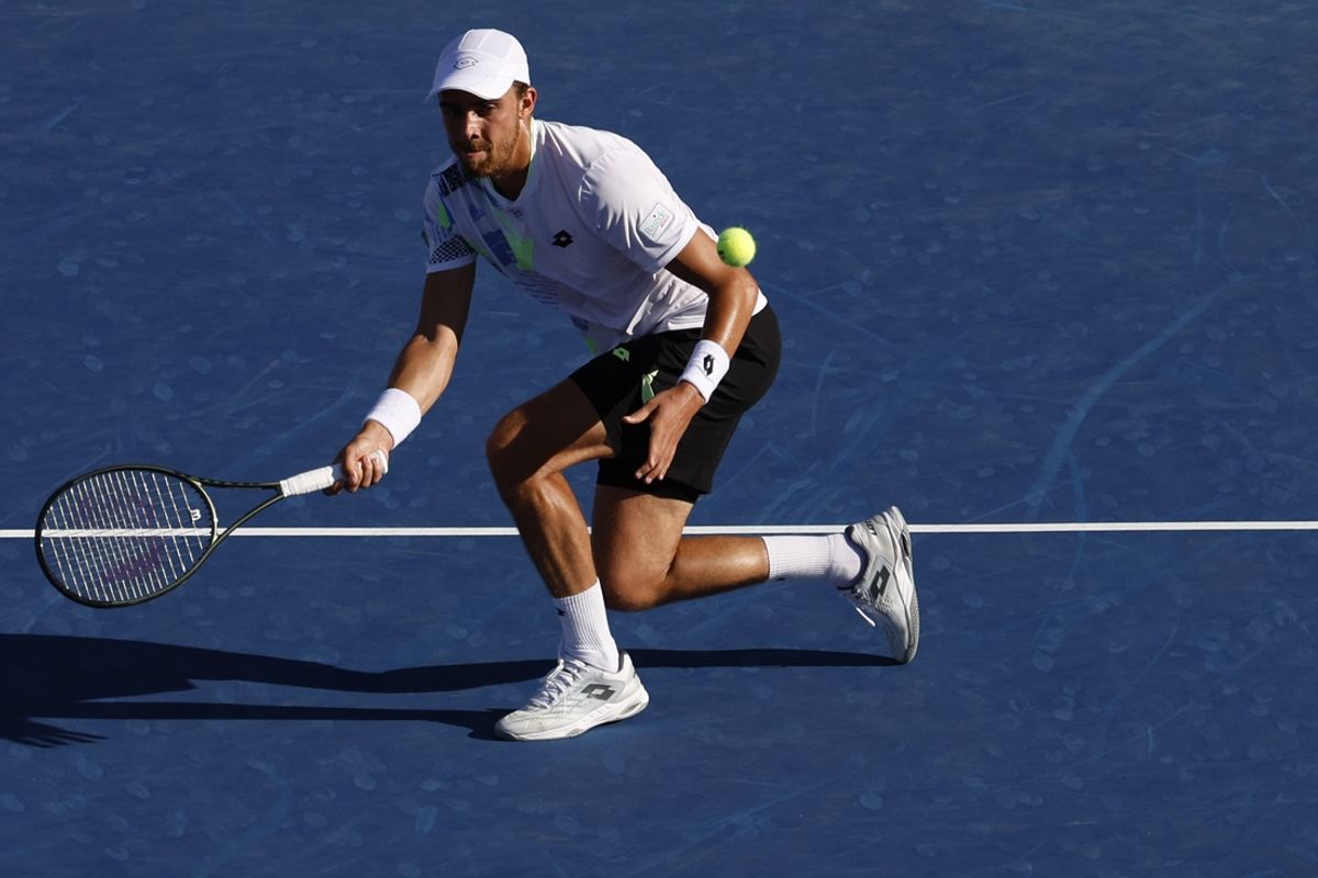 Sep 1, 2023; Flushing, NY, USA; Benjamin Bonzi of France hits a volley against Dominic Stricker of Switzerland (not pictured) on day five of the 2023 U.S. Open tennis tournament at USTA Billie Jean King National Tennis Center. Mandatory Credit: Geoff Burke-Imagn Images