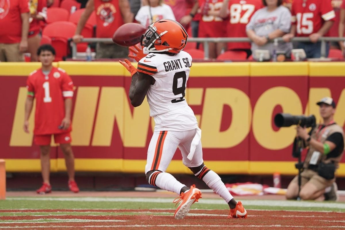 Aug 26, 2023; Kansas City, Missouri, USA; Cleveland Browns wide receiver Jakeem Grant Sr. (9) receives the opening kickoff against the Kansas City Chiefs during the game at GEHA Field at Arrowhead Stadium. Mandatory Credit: Denny Medley-USA TODAY Sports