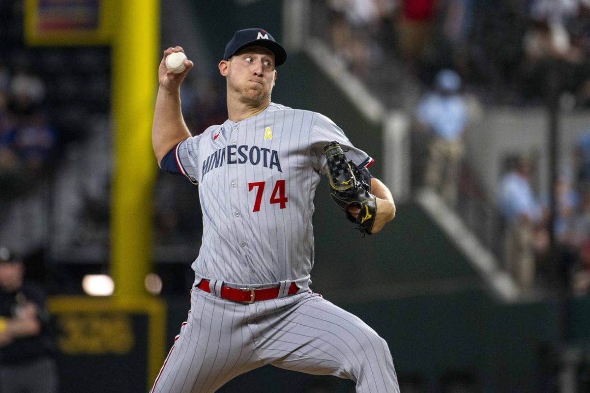 Sep 3, 2023; Arlington, Texas, USA; Minnesota Twins relief pitcher Josh Winder (74) pitches against the Texas Rangers during the ninth inning at Globe Life Field. Mandatory Credit: Jerome Miron-USA TODAY Sports