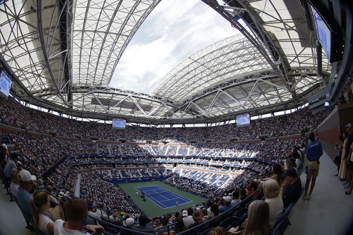 Sep 5, 2023; Flushing, NY, USA; A view of the partially closed roof at Arthur Ashe Stadium, to compensate for hot conditions, during the match between Taylor Fritz of the United States (top) and Novak Djokovic of Serbia (bottom) on day nine of the 2023 U.S. Open tennis tournament at USTA Billie Jean King National Tennis Center. Mandatory Credit: Geoff Burke-Imagn Images