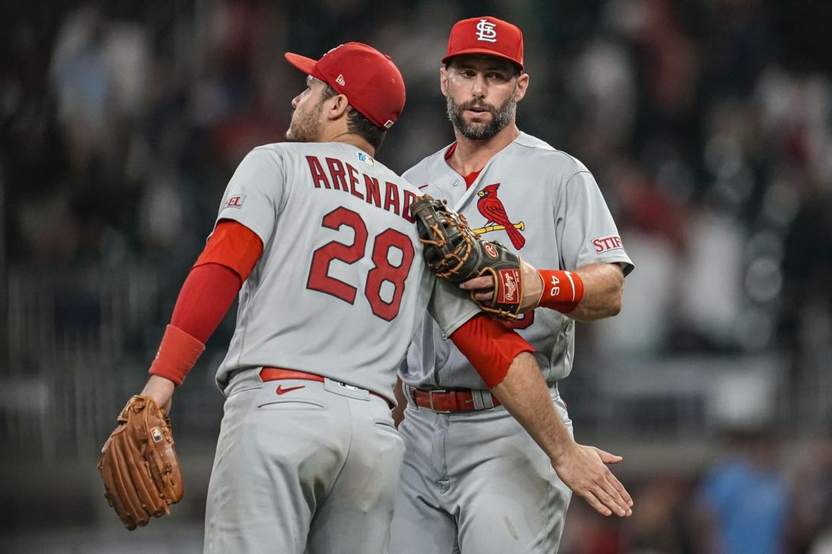 Sep 6, 2023; Cumberland, Georgia, USA; St. Louis Cardinals third baseman Nolan Arenado (28) and first baseman Paul Goldschmidt (46)  react after defeating the Atlanta Braves at Truist Park. Mandatory Credit: Dale Zanine-USA TODAY Sports