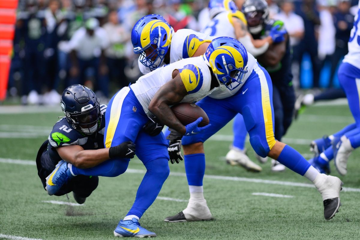 Sep 10, 2023; Seattle, Washington, USA; Seattle Seahawks linebacker Uchenna Nwosu (10) tackles Los Angeles Rams running back Cam Akers (3) during the second half at Lumen Field. Mandatory Credit: Steven Bisig-Imagn Images
