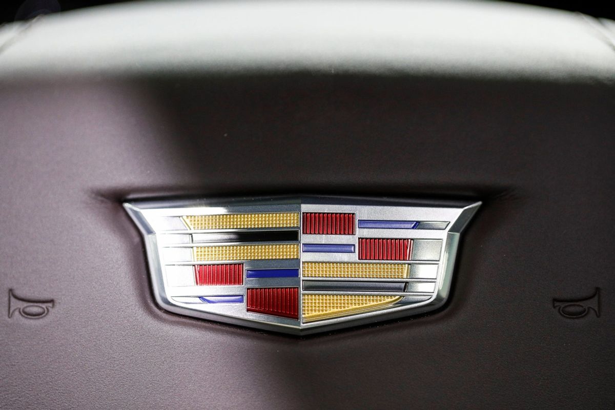 Cadillac logo on the steering wheel of a 2023 Cadillac Escalade-V during the 2023 North American International Auto Show held at Huntington Place in downtown Detroit on Wed., Sept. 13, 2023.