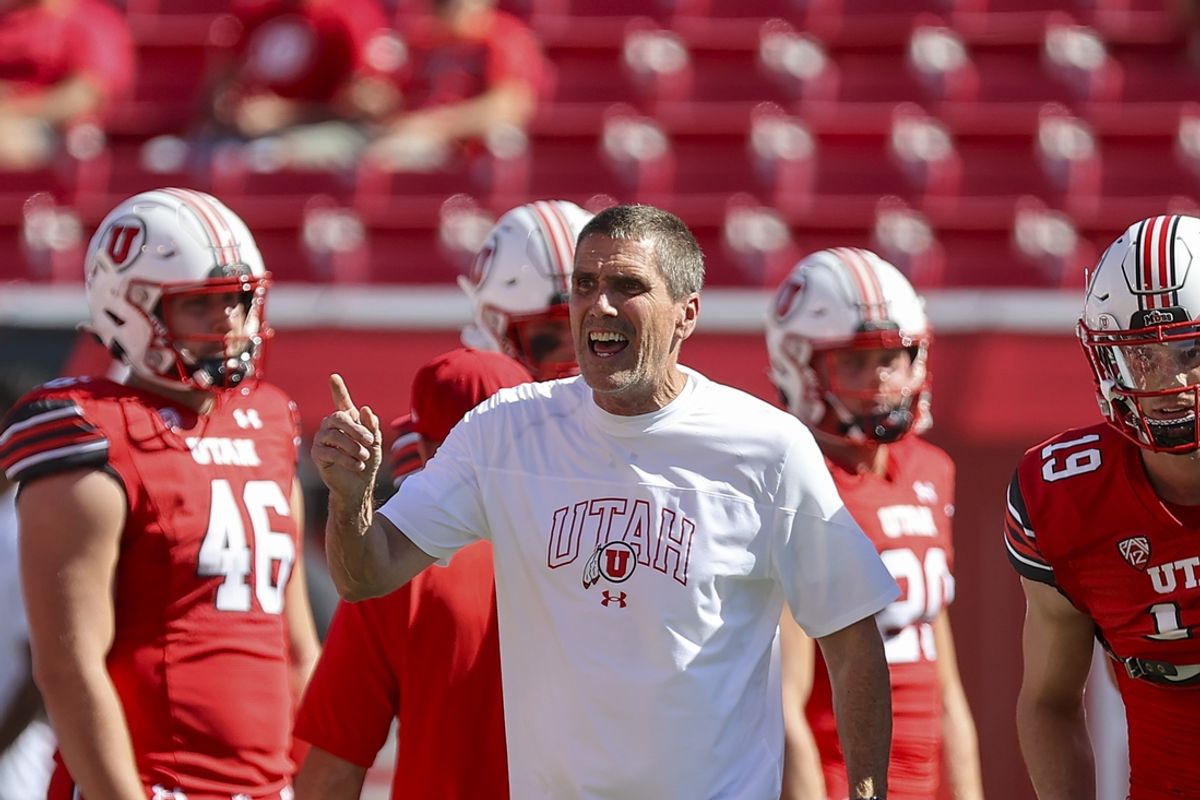 Sep 16, 2023; Salt Lake City, Utah, USA; Utah Utes offensive coordinator Andy Ludwig prepares his team before a game against the Weber State Wildcats at Rice-Eccles Stadium. Mandatory Credit: Rob Gray-Imagn Images