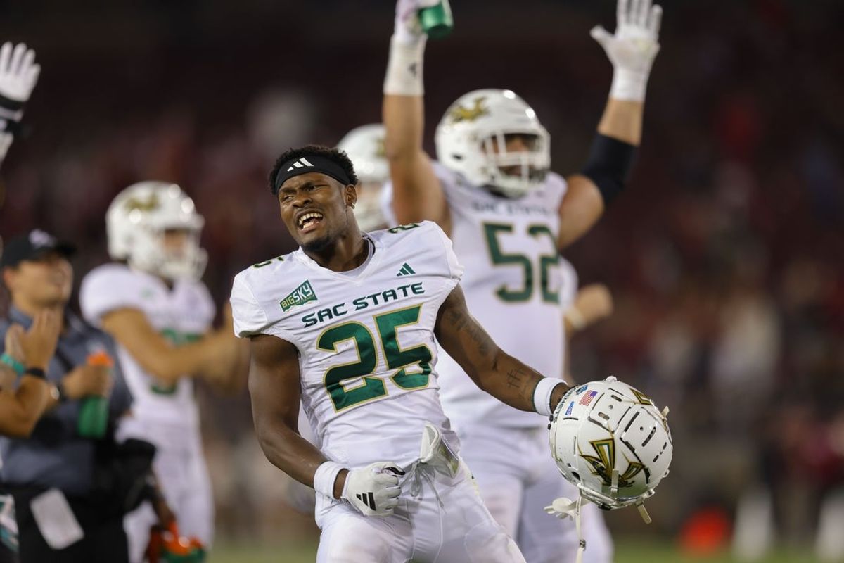 Sep 16, 2023; Stanford, California, USA; Sacramento State Hornets running back Elijah Tau-Tolliver (25) celebrates after a touchdown during the fourth quarter against the Stanford Cardinal at Stanford Stadium. Mandatory Credit: Sergio Estrada-Imagn Images