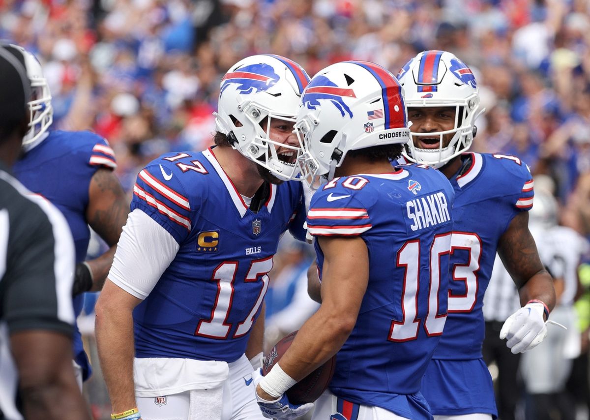 Bills quarterback Josh Allen congratulates receiver Khalil Shakir on his touchdown catch.