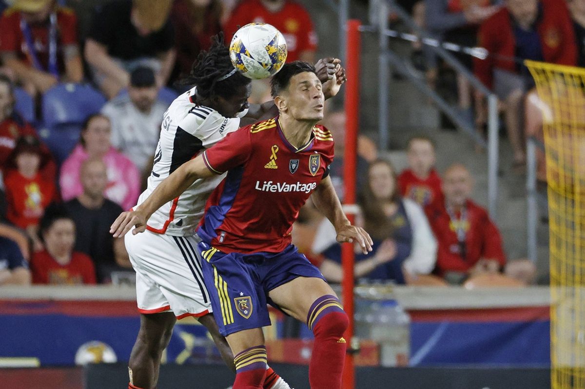 Sep 20, 2023; Sandy, Utah, USA; FC Dallas defender Geovane Jesus (2) and Real Salt Lake midfielder Damir Kreilach (8) battle in the second half at America First Field. Mandatory Credit: Jeff Swinger-Imagn Images