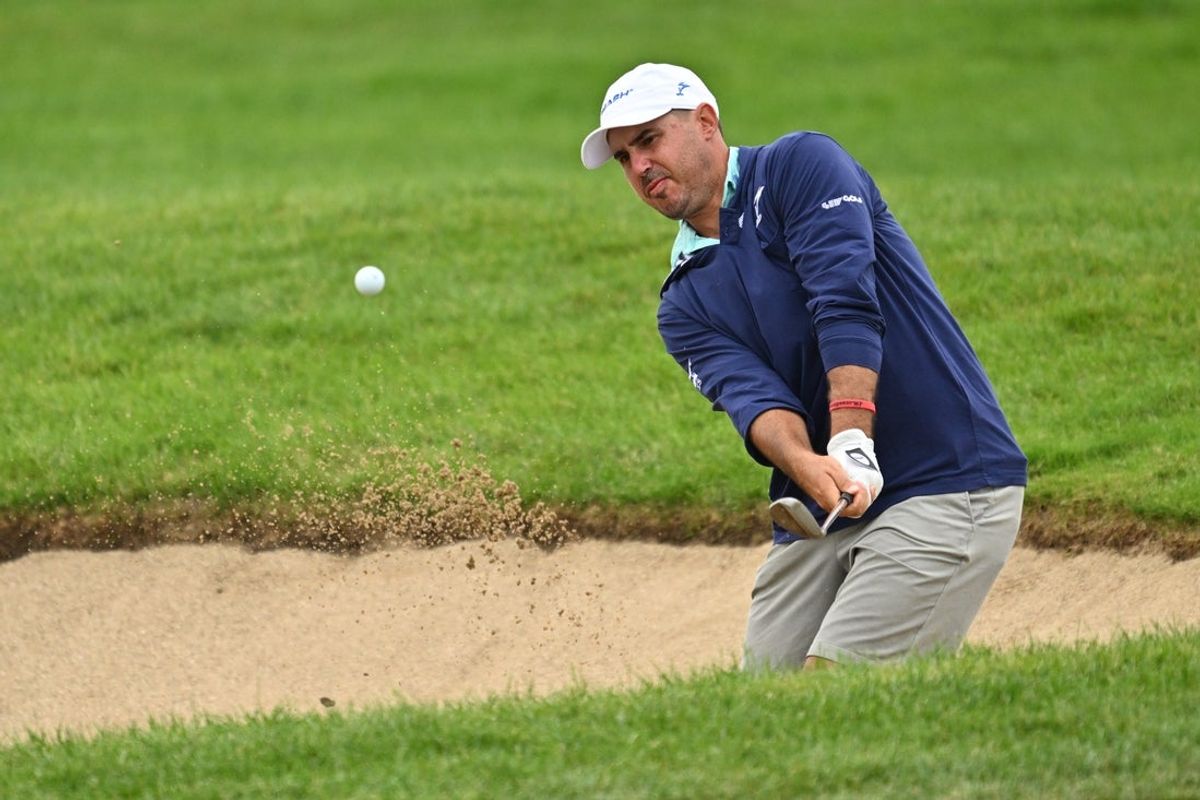 Sep 22, 2023; Sugar Grove, Illinois, USA; Chase Koepka hits out of a bunker on the second green during the first round of the LIV Golf Chicago golf tournament at Rich Harvest Farms. Mandatory Credit: Jamie Sabau-Imagn Images