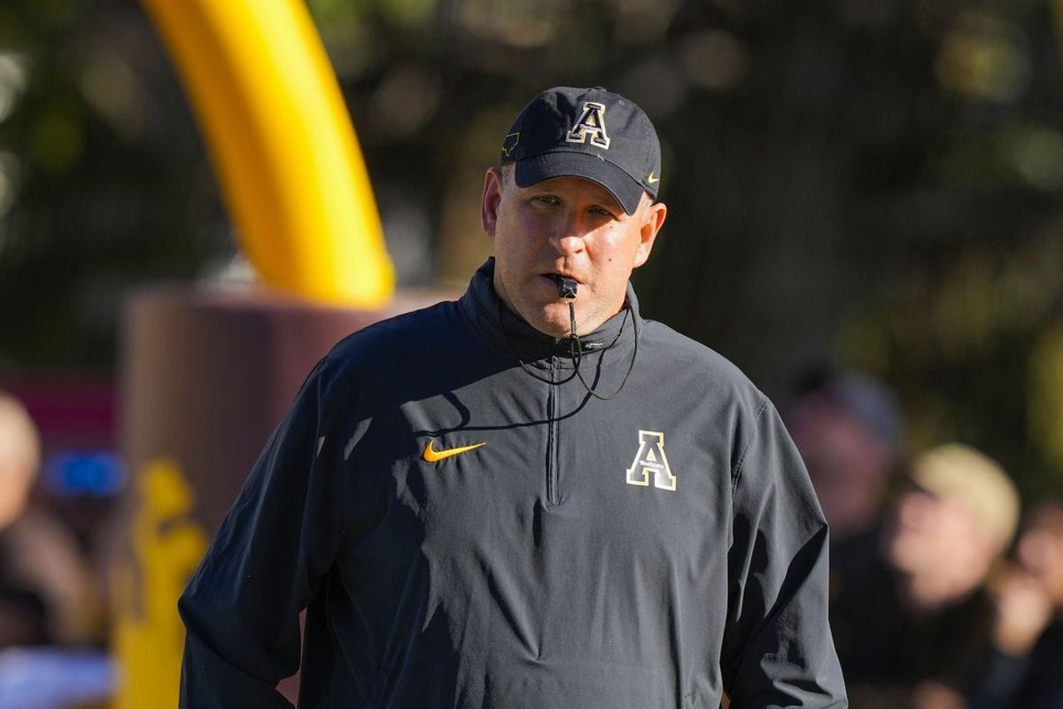 Sep 23, 2023; Laramie, Wyoming, USA; Appalachian State Mountaineers head coach Shawn Clark looks on before game against the Wyoming Cowboys at Jonah Field at War Memorial Stadium. Mandatory Credit: Troy Babbitt-Imagn Images