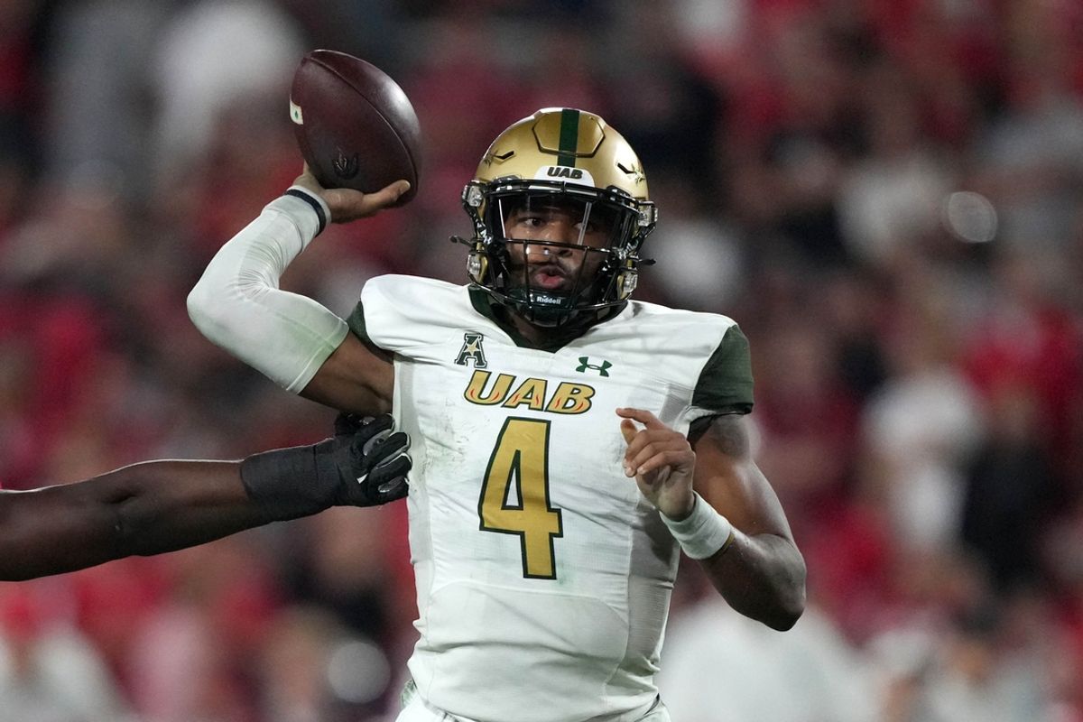 Sep 23, 2023; Athens, Georgia, USA; UAB Blazers quarterback Jacob Zeno (4) throws the ball against the Georgia Bulldogs in the second half at Sanford Stadium. Mandatory Credit: Kirby Lee-Imagn Images