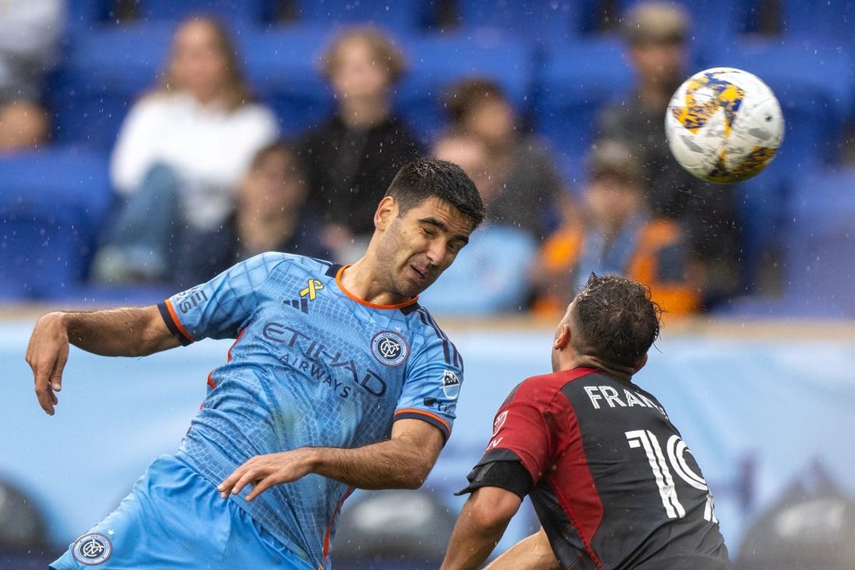 Sep 24, 2023; Harrison, New Jersey, USA; New York City FC forward Andres Jasson (21) heads the ball on goal defended by Toronto FC midfielder Kobe Franklin (19) during the second half at Red Bull Arena. Mandatory Credit: Mark Smith-USA TODAY Sports