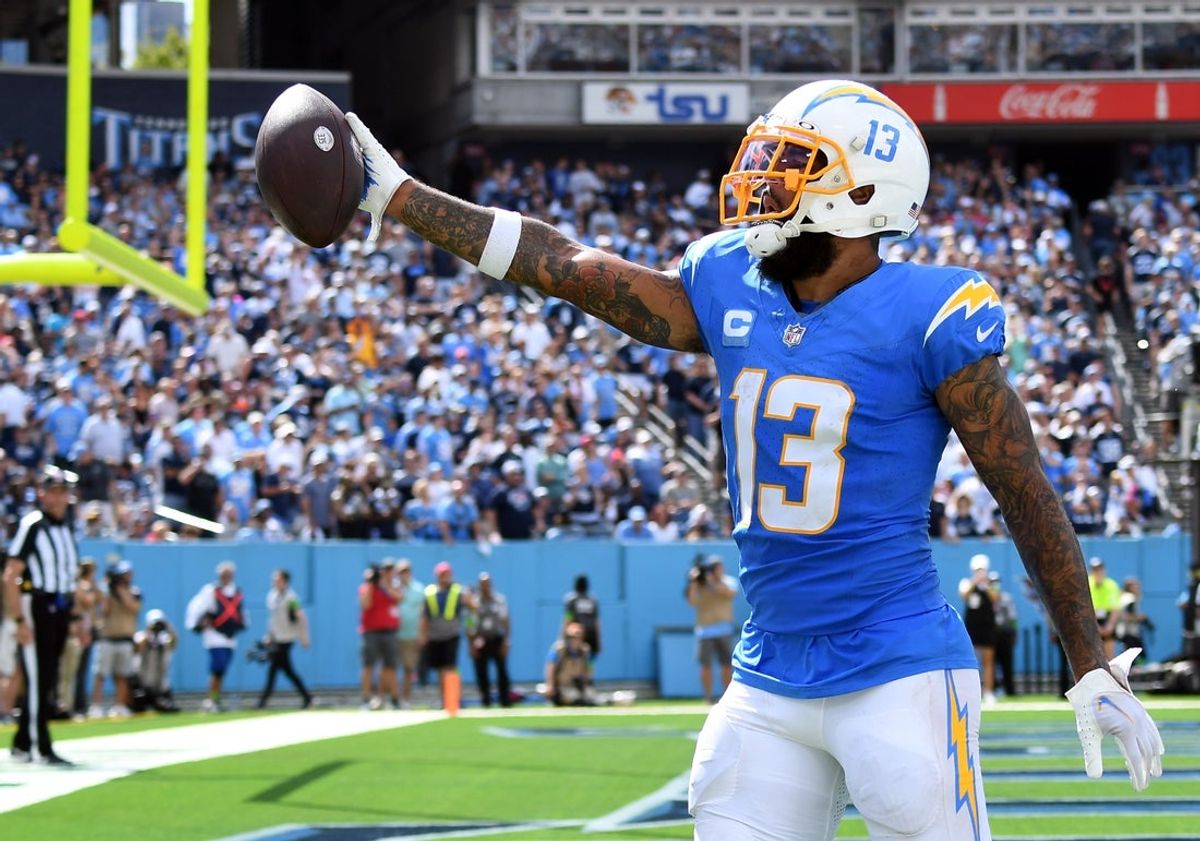 Sep 17, 2023; Nashville, Tennessee, USA; Los Angeles Chargers wide receiver Keenan Allen (13) celebrates after a touchdown against the Tennessee Titans at Nissan Stadium. Mandatory Credit: Christopher Hanewinckel-Imagn Images