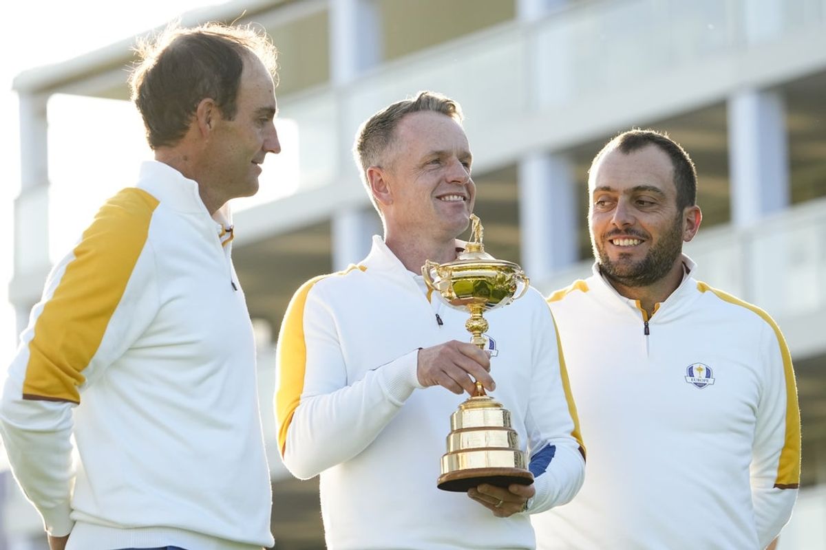 Sep 26, 2023; Rome, ITA; Team Europe captain Luke Donald stands with vice-captains Edoardo Molinari, left, and Francesco Molinari during a team photo prior to a practice round of the Ryder Cup golf competition at Marco Simone Golf and Country Club. Mandatory Credit: Adam Cairns-Imagn Images