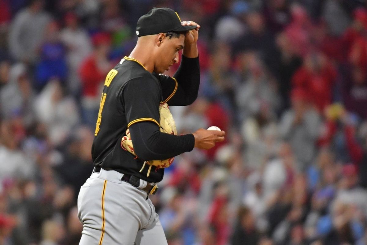 Sep 27, 2023; Philadelphia, Pennsylvania, USA; Pittsburgh Pirates starting pitcher Johan Oviedo (24) reacts after allowing home run against the Philadelphia Phillies during the fourth inning  Citizens Bank Park. Mandatory Credit: Eric Hartline-Imagn Images