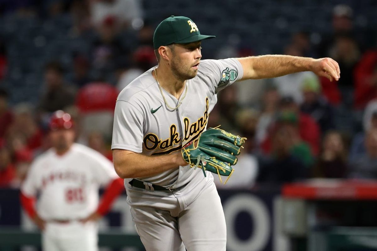 Sep 29, 2023; Anaheim, California, USA;  Oakland Athletics starting pitcher Ken Waldichuk (64) pitches during the second inning against the Los Angeles Angels at Angel Stadium. Mandatory Credit: Kiyoshi Mio-USA TODAY Sports