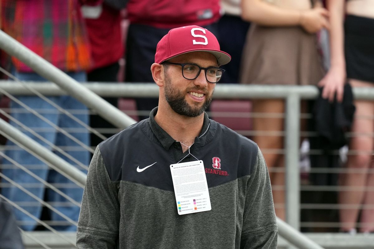 Sep 30, 2023; Stanford, California, USA; Stanford Cardinal and NFL former quarterback Andrew Luck stands on the sidelines during the second quarter against the Oregon Ducks at Stanford Stadium. Mandatory Credit: Darren Yamashita-Imagn Images