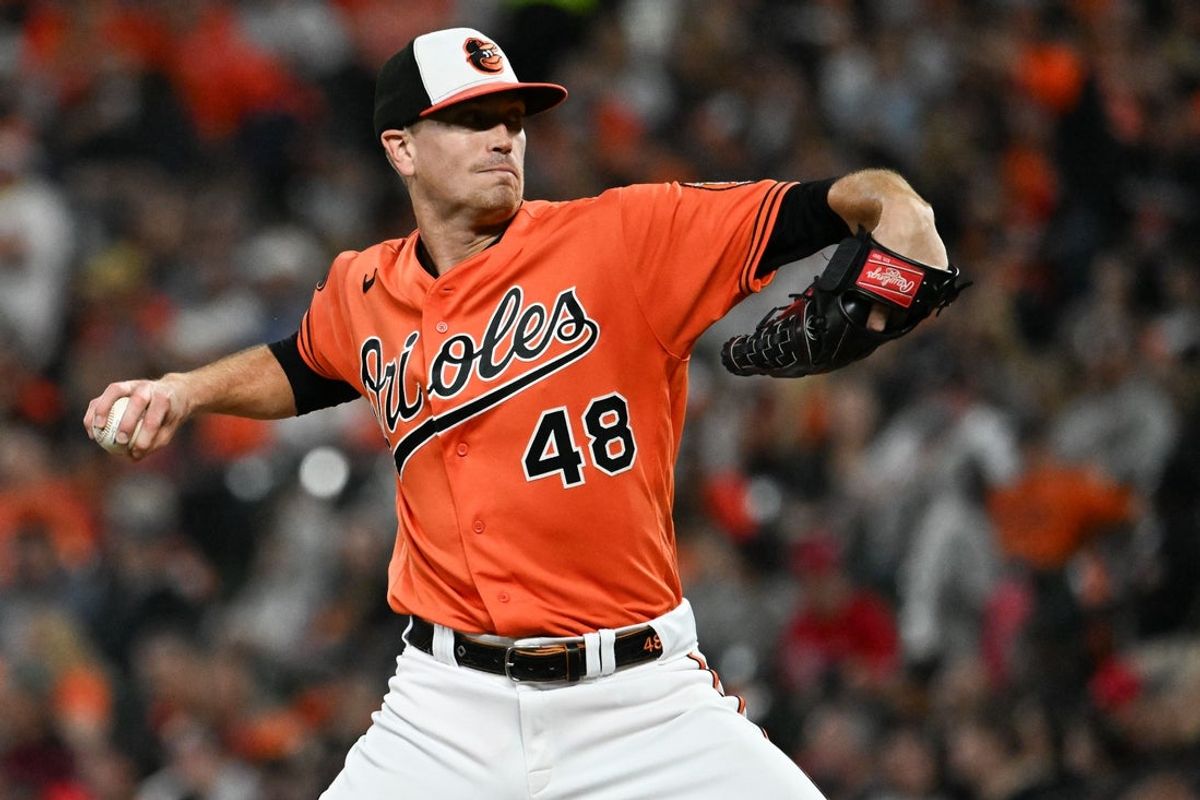 Sep 30, 2023; Baltimore, Maryland, USA;  Baltimore Orioles starting pitcher Kyle Gibson (48) throws a first inning pitch against the Boston Red Sox  at Oriole Park at Camden Yards. Mandatory Credit: Tommy Gilligan-Imagn Images