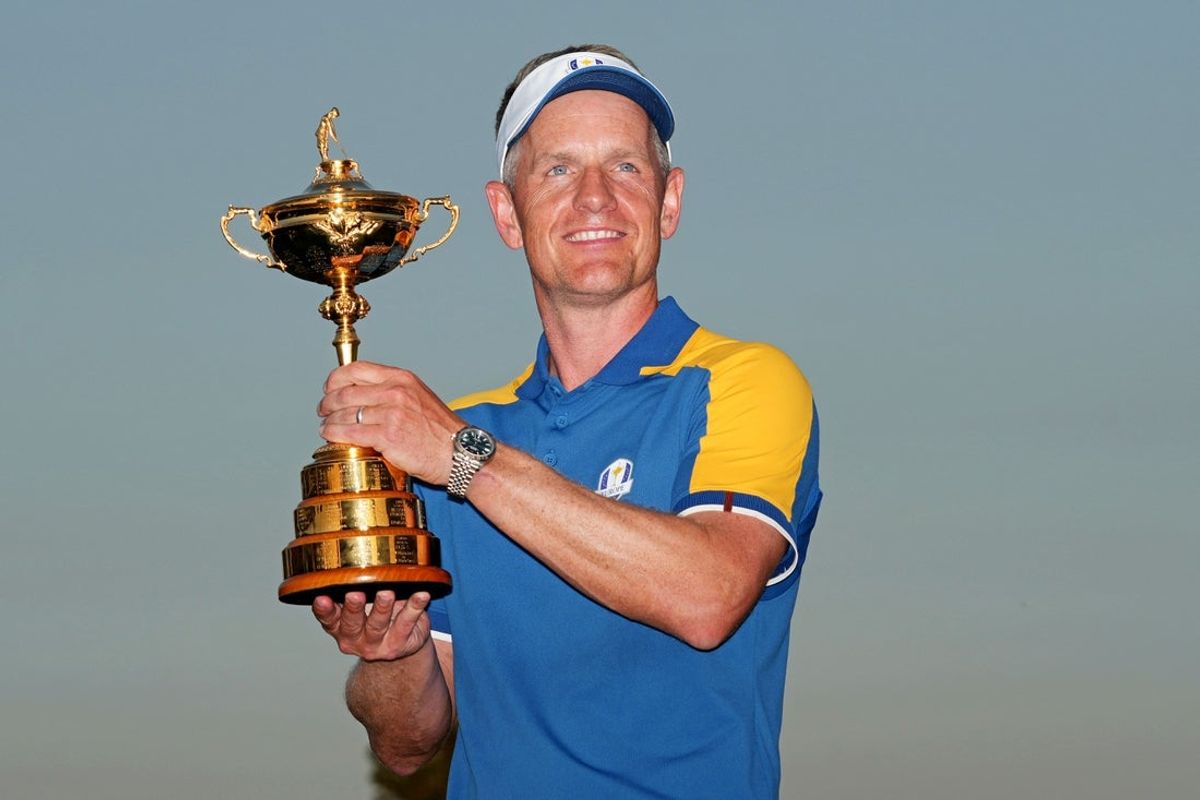 Oct 1, 2023; Rome, ITA; Team Europe captain Luke Donald poses with the Ryder Cup after Team Europe beat Team USA  during the final day of the 44th Ryder Cup golf competition at Marco Simone Golf and Country Club. Mandatory Credit: Kyle Terada-Imagn Images