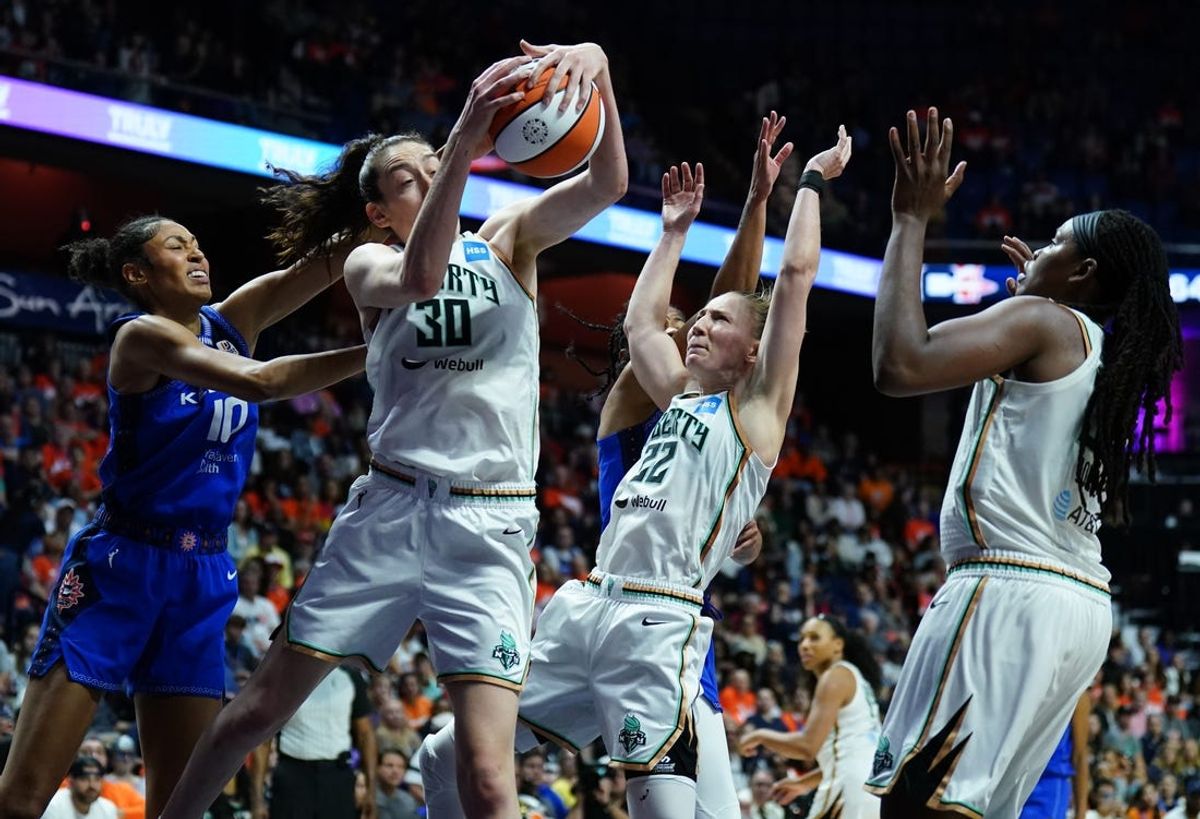 Oct 1, 2023; Uncasville, Connecticut, USA; New York Liberty forward Breanna Stewart (30) grabs the rebound against Connecticut Sun forward Olivia Nelson-Ododa (10) in the second half during game four of the 2023 WNBA Playoffs at Mohegan Sun Arena. Mandatory Credit: David Butler II-USA TODAY Sports