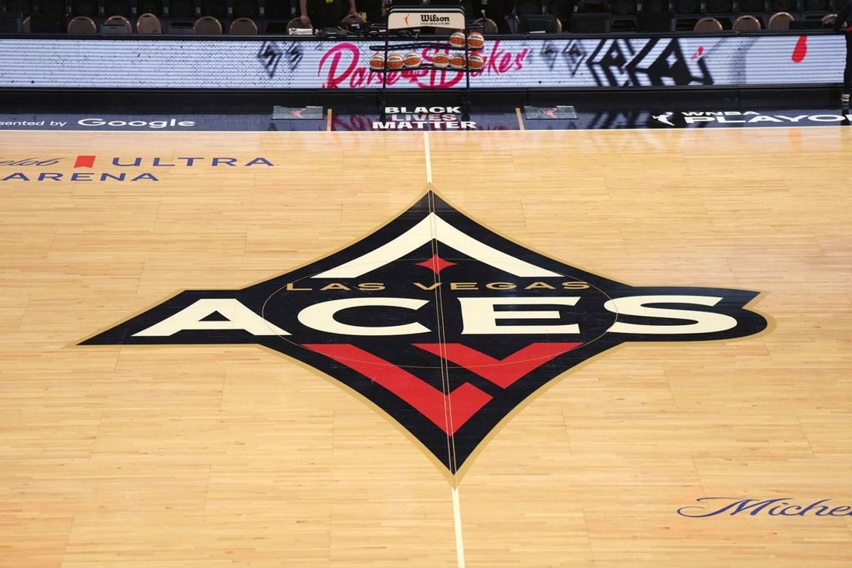 Sep 24, 2023; Las Vegas, Nevada, USA; The Las Vegas Aces logo at center court during game one of the 2023 WNBA Semifinals at Michelob Ultra Arena. Mandatory Credit: Kirby Lee-USA TODAY Sports
