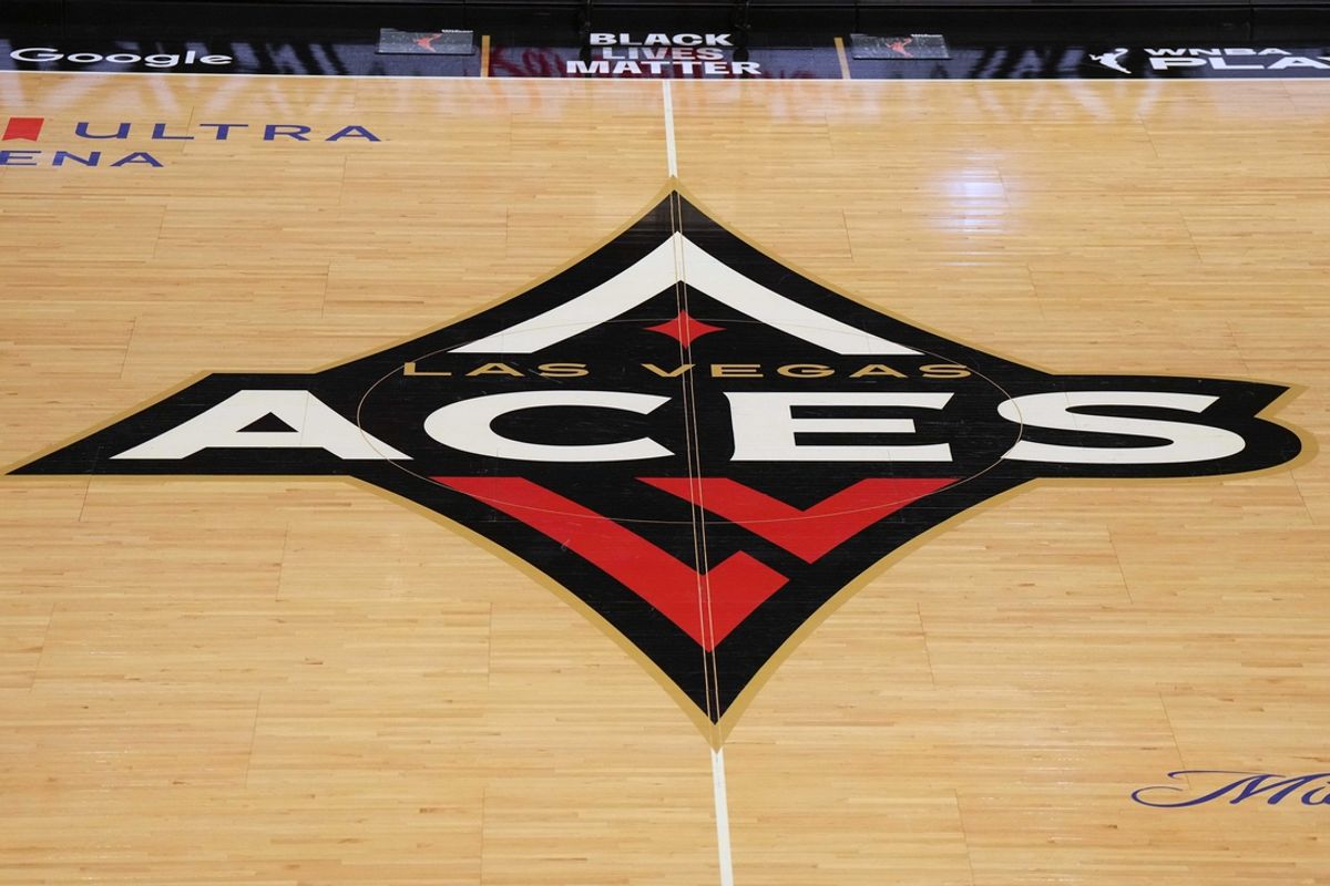 Sep 24, 2023; Las Vegas, Nevada, USA; The Las Vegas Aces logo at center court during game one of the 2023 WNBA Semifinals at Michelob Ultra Arena. Mandatory Credit: Kirby Lee-Imagn Images