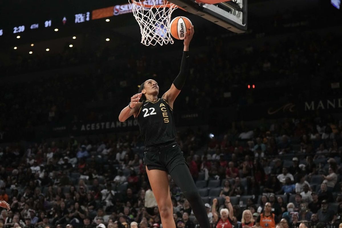 Sep 24, 2023; Las Vegas, Nevada, USA; Las Vegas Aces center A'ja Wilson (22) shoots the ball against the Dallas Wings during game one of the 2023 WNBA Semifinals at Michelob Ultra Arena. The Aces defeated the Wings 97-83. Mandatory Credit: Kirby Lee-USA TODAY Sports
