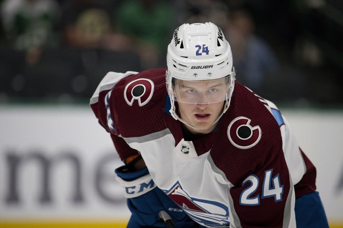 Oct 3, 2023; Dallas, Texas, USA; Colorado Avalanche right wing Oskar Olausson (24) waits for the face-off against the Dallas Stars during the first period at the American Airlines Center. Mandatory Credit: Jerome Miron-Imagn Images