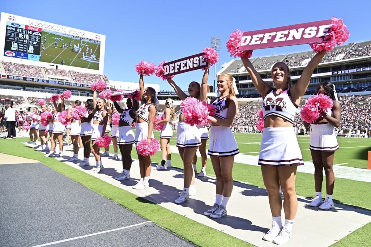 Oct 7, 2023; Starkville, Mississippi, USA; Mississippi State Bulldogs cheerleaders cheer during the third quarter of the game against the Western Michigan Broncos at Davis Wade Stadium at Scott Field. Mandatory Credit: Matt Bush-Imagn Images
