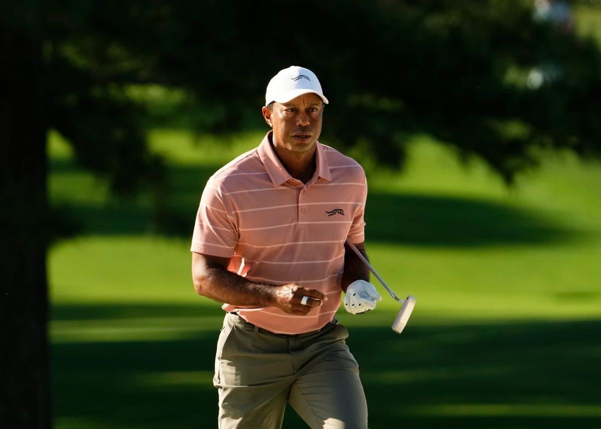 Apr 11, 2024; Augusta, Georgia, USA; Tiger Woods walks onto the No. 7 green during the first round of the Masters Tournament.