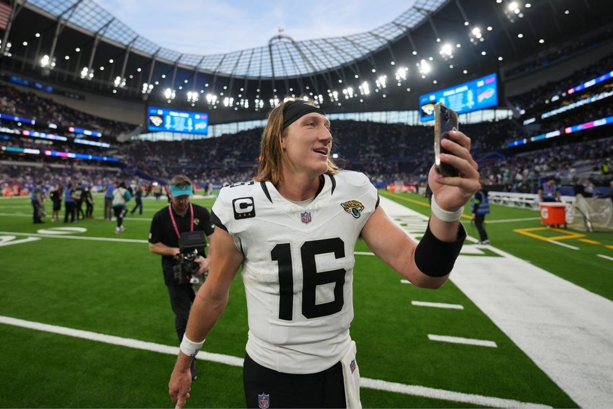 Oct 8, 2023; London United Kingdom; Jacksonville Jaguars quarterback Trevor Lawrence (16) walks off the field after an NFL International Series game against the Buffalo Bills at Tottenham Hotspur Stadium. Mandatory Credit: Kirby Lee-USA TODAY Sports