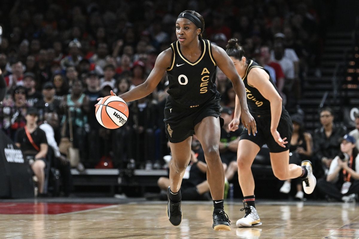 Oct 8, 2023; Las Vegas, Nevada, USA; Las Vegas Aces guard Jackie Young (0) dribbles the ball up court against the New York Liberty in the second half during game one of the 2023 WNBA Finals at Michelob Ultra Arena. Mandatory Credit: Candice Ward-USA TODAY Sports